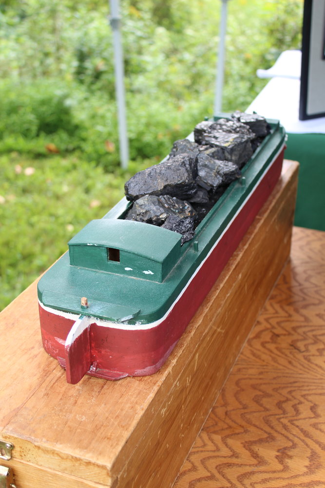 A model of a canal boat. Note the small cabin for the family.